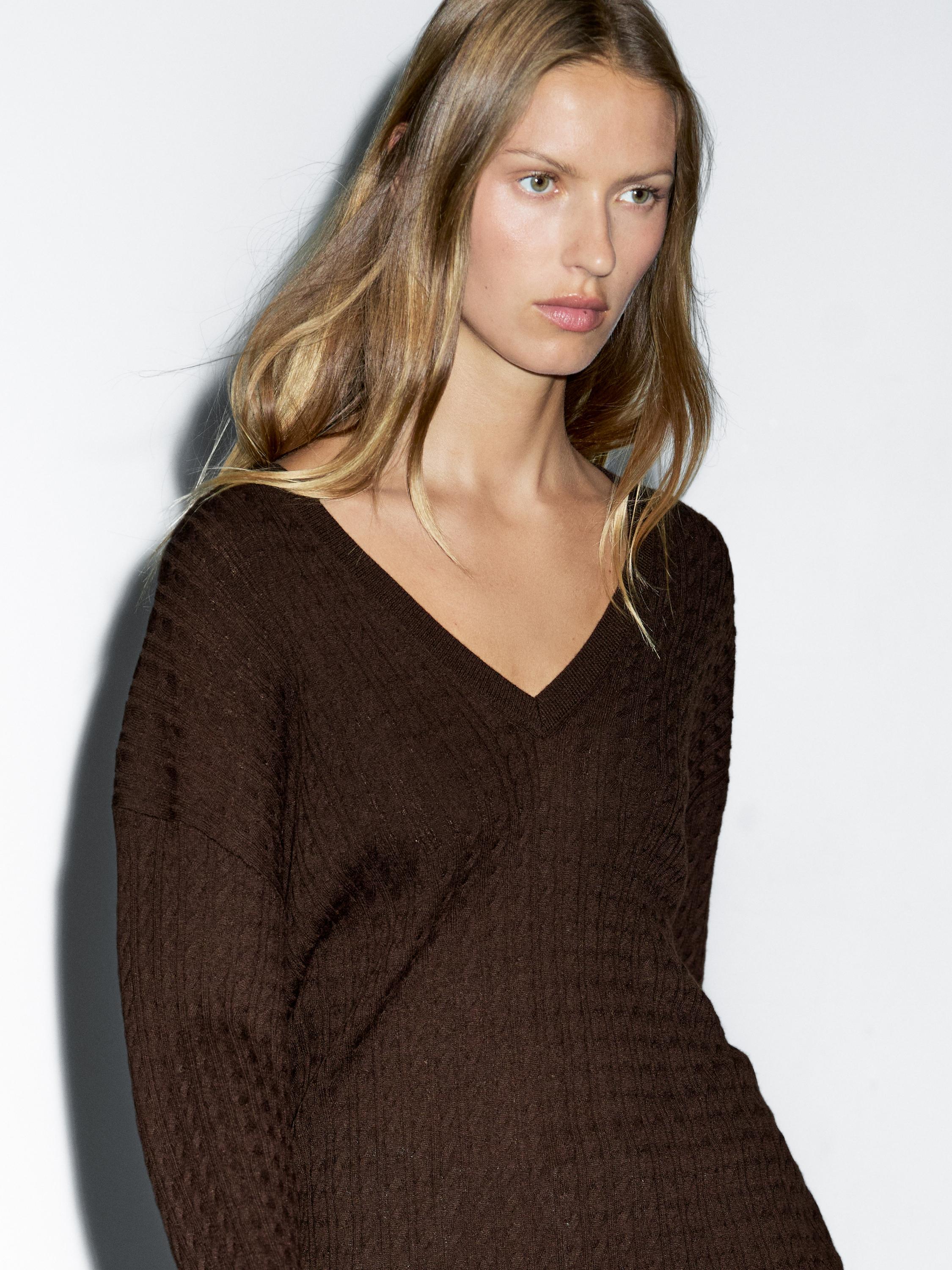 V-neck cable-knit sweater